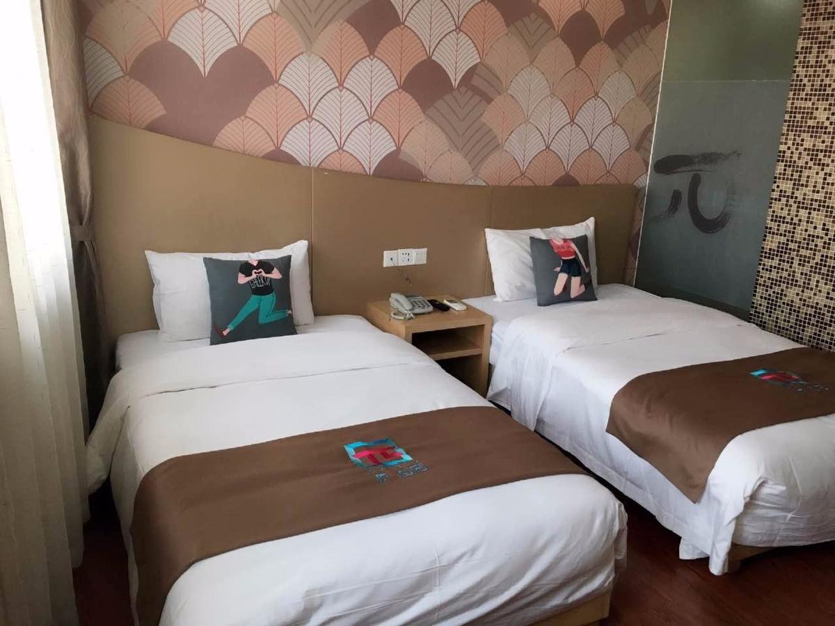 Pai Hotel Chongqing Qijiang Bus Station Екстериор снимка